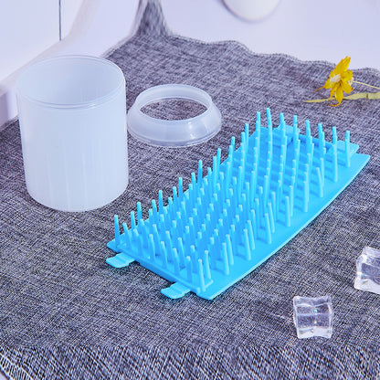 CleanPaws Paw-Cleaner Cup Kit parts shown separated: cup body, retaining ring, and silicone bristle insert
