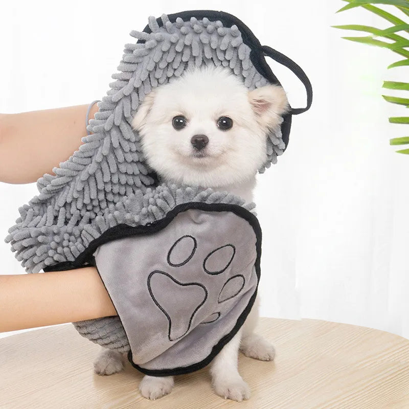 Dog wrapped in grey DryDash quick-dry pocket towel, in-use photo