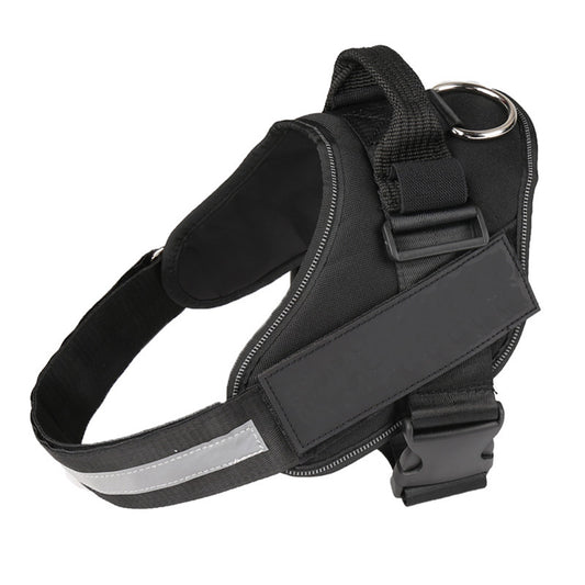 Black no-pull dog harness with padded chest panel, top handle, D-ring, and reflective strip, on white background.